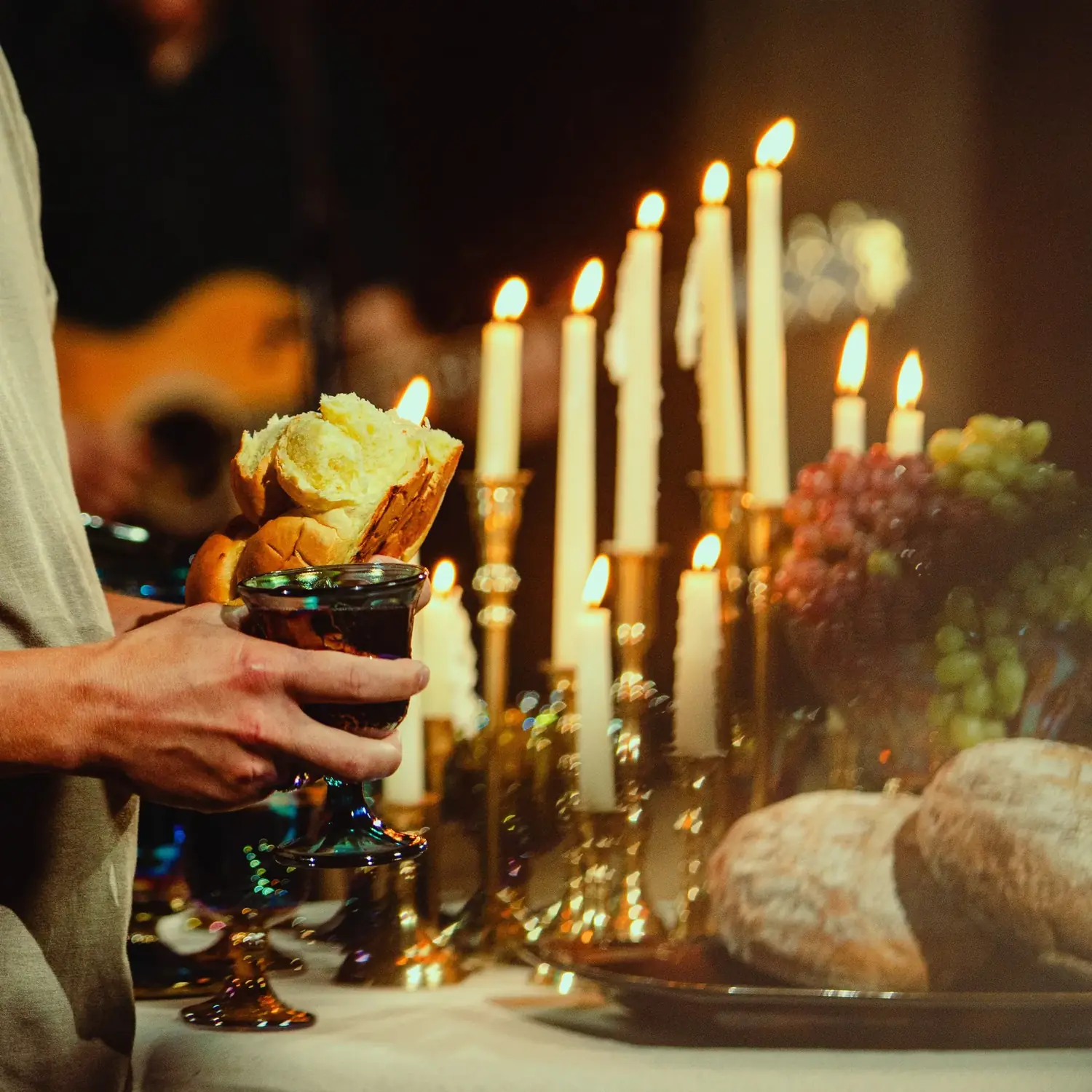 Formal dining event at The Table, The Old Ruth — long table set with candles, florals, and fine linens