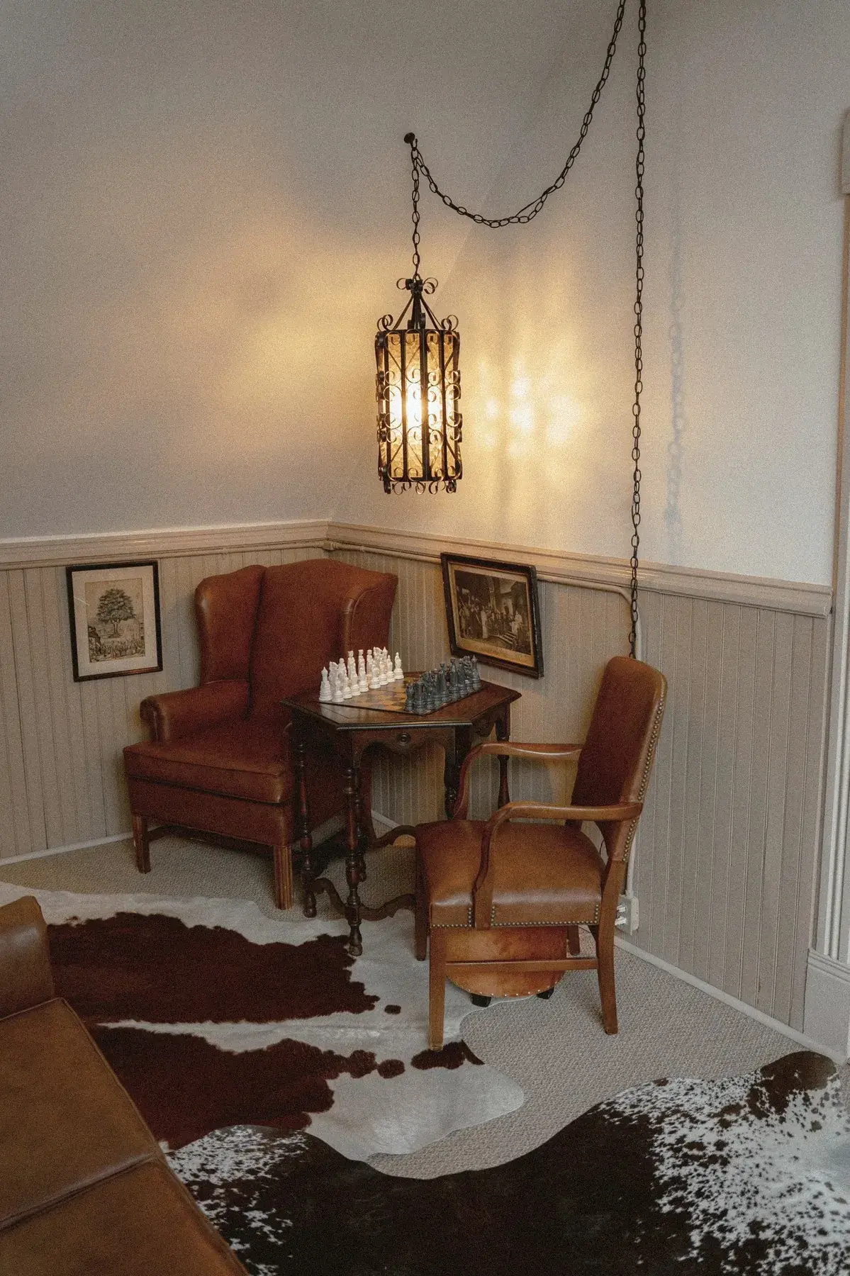 Chess nook with leather wingback at The Old Ruth