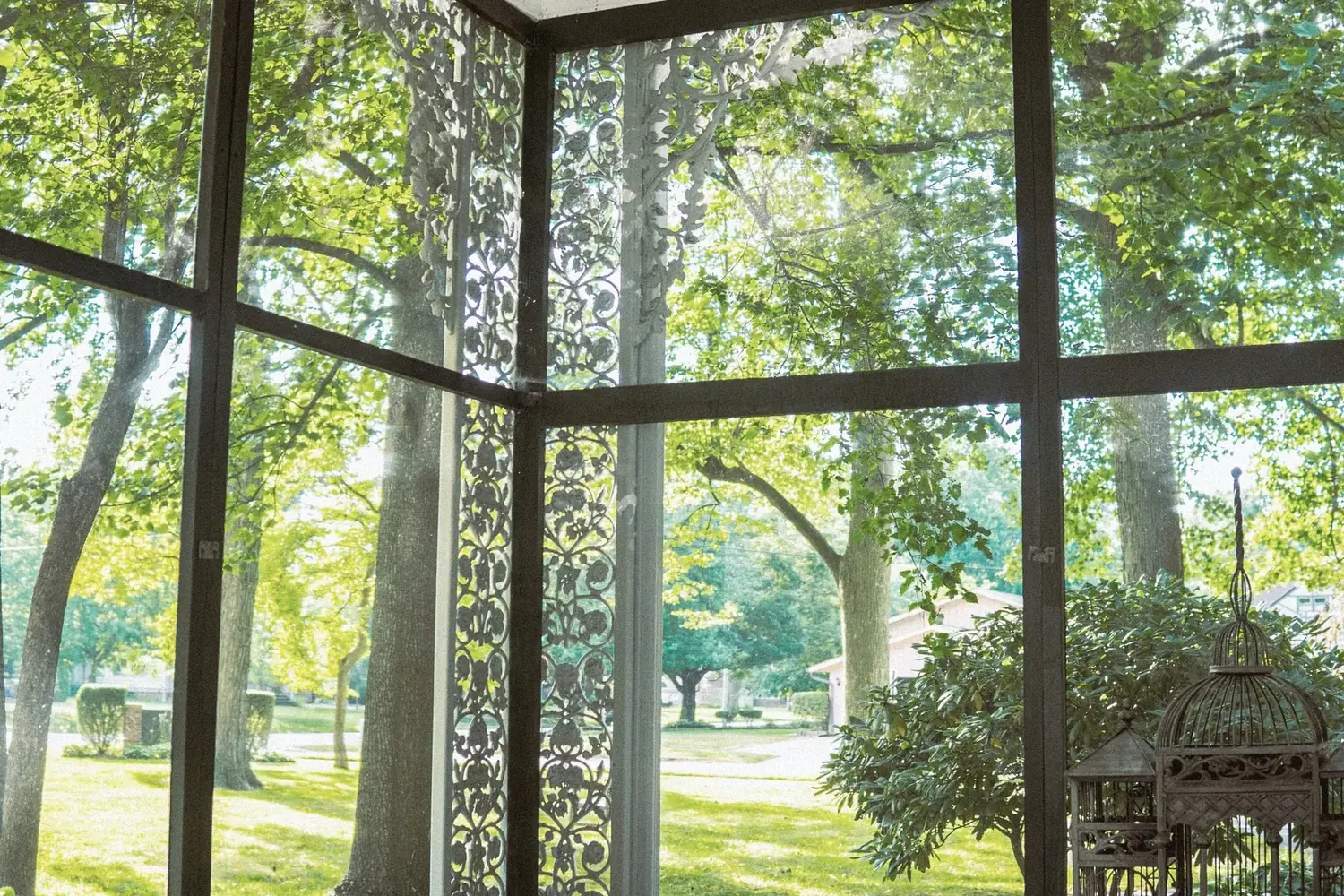 Ornate ironwork veranda of The Old Ruth, circa 1888